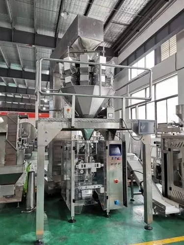 Multi-head weigher and vertical form-fill-seal machine packing sugar at a processing plant